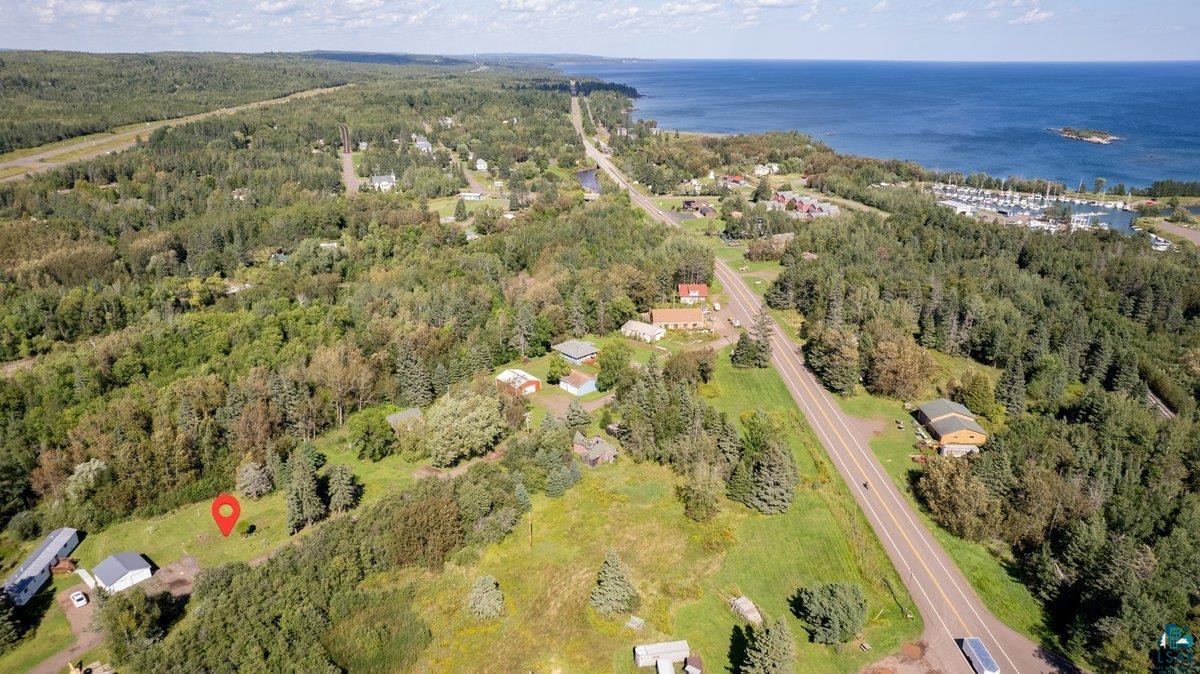 135 Coolidge Road Knife River, MN 55804 - Photo 4 of 6 Birds eye view of property with a water view