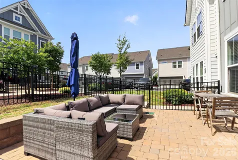 a outdoor space with patio the couches and a potted plant