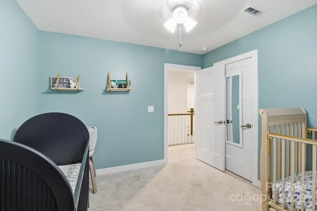 a room with a door and a bathroom