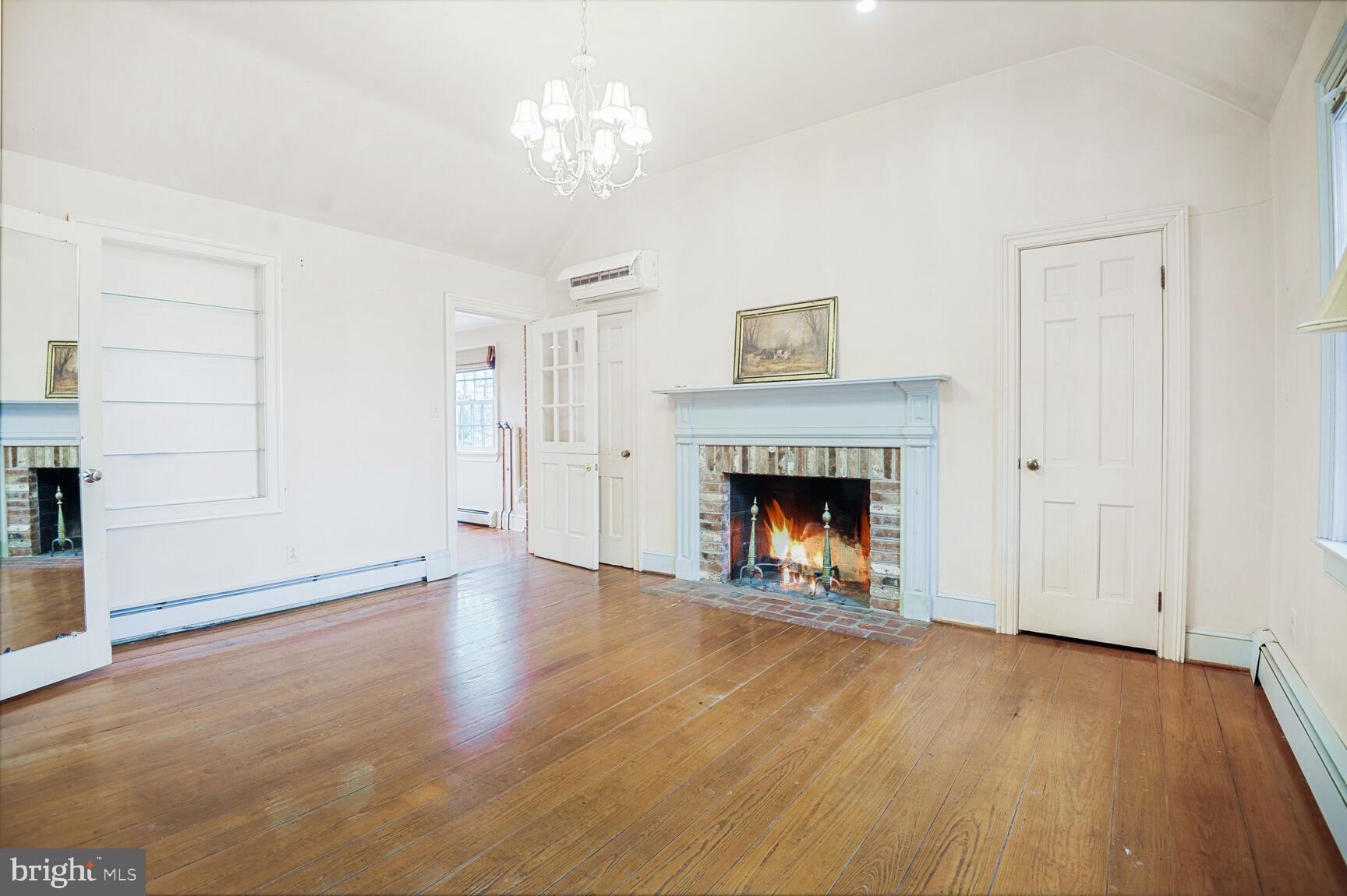 1600 Briggs Road Berryville, VA 22611 - Photo 15 of 38 Main level bedroom with fireplace