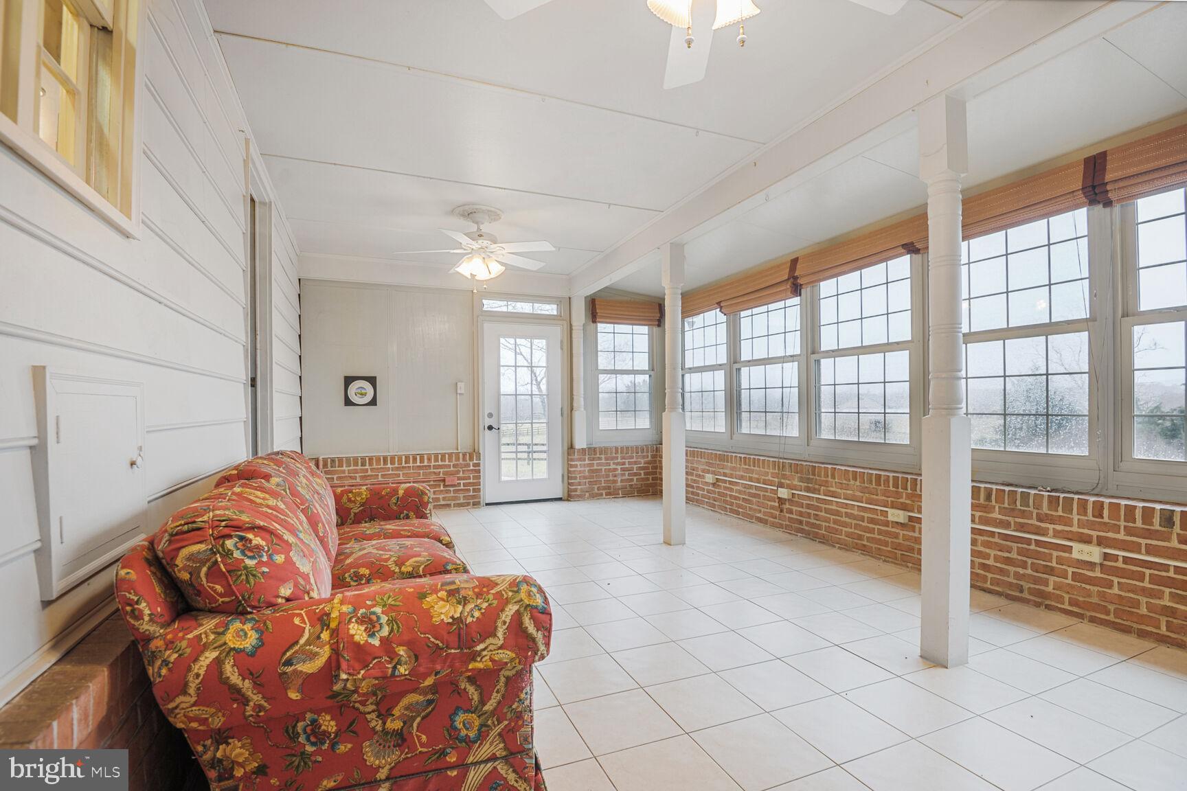 1600 Briggs Road Berryville, VA 22611 - Photo 8 of 38 Light-filled sunroom off kitchen