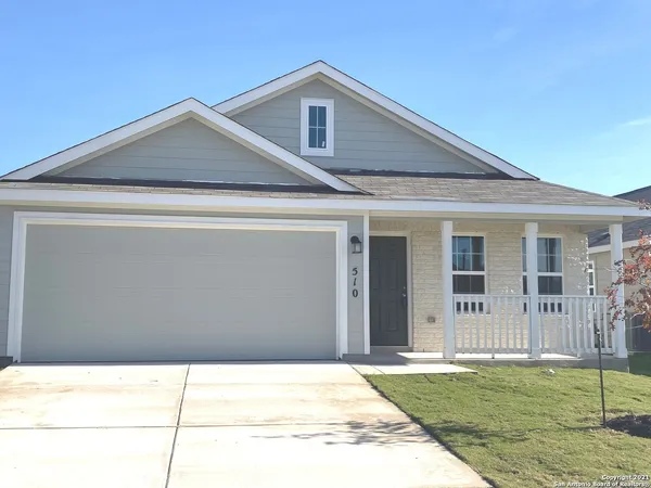 a house view with a garden