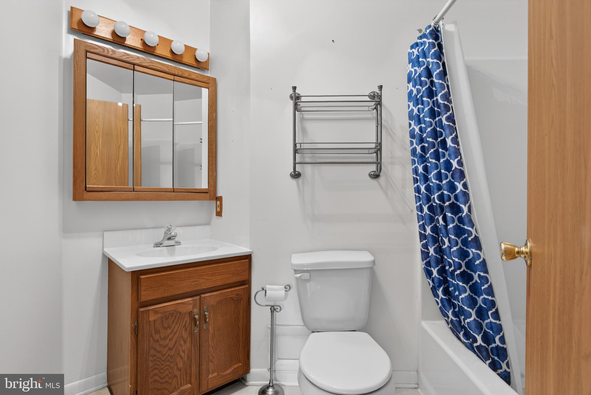 342 Larkin Drive Red Lion, PA 17356 - Photo 15 of 38 a bathroom with a toilet sink and mirror