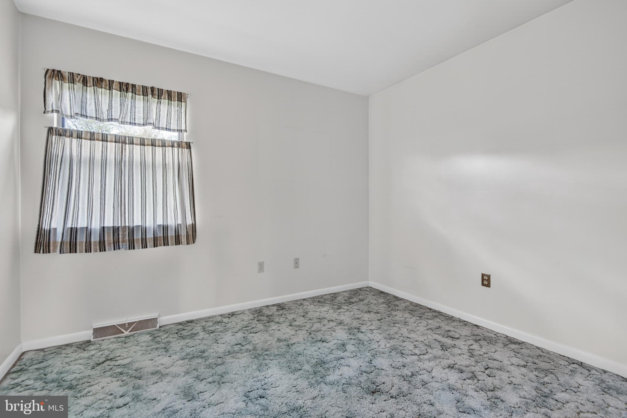 342 Larkin Drive Red Lion, PA 17356 - Photo 17 of 38 a view of an empty room with a window