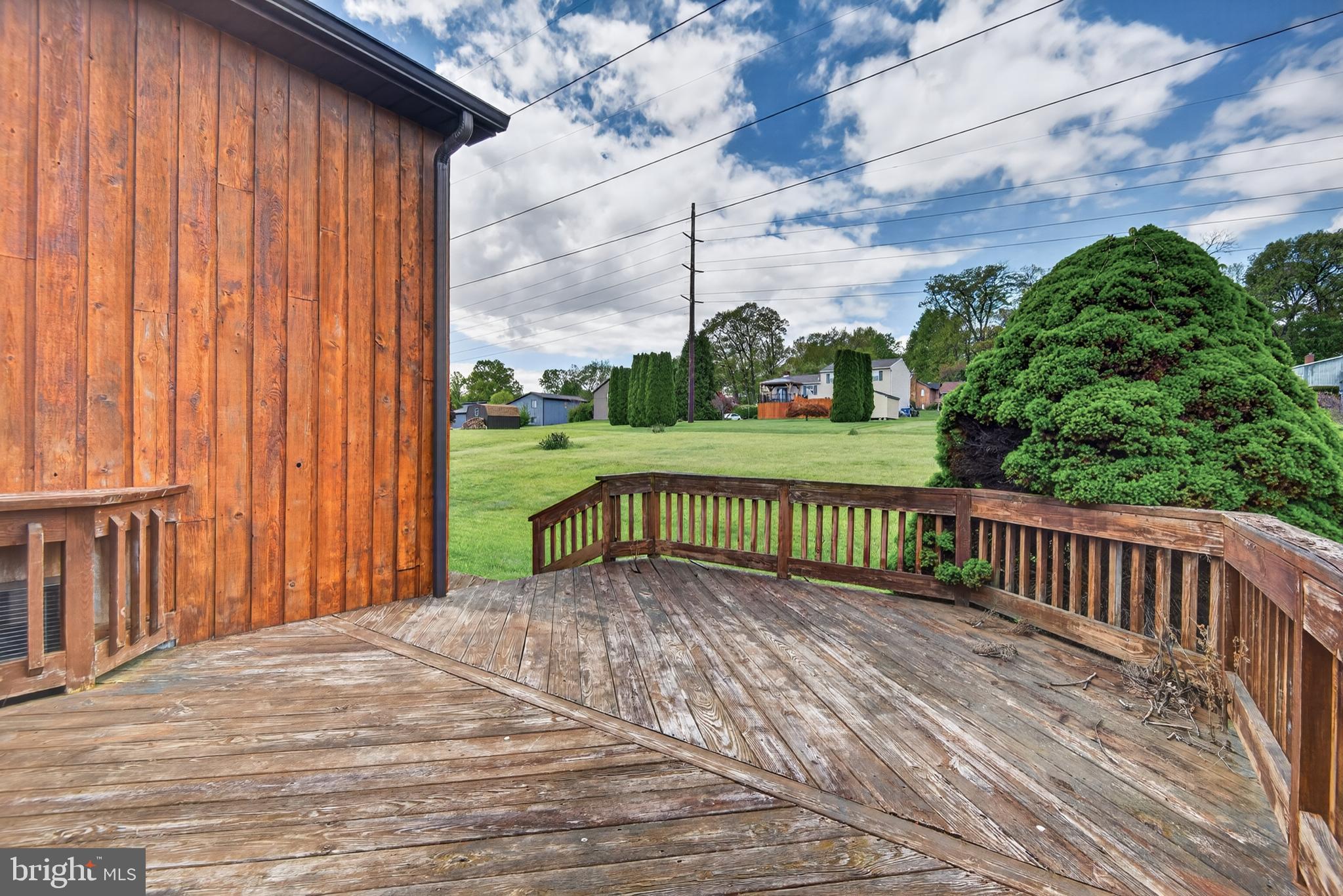 342 Larkin Drive Red Lion, PA 17356 - Photo 29 of 38 a view of a wooden deck with a yard