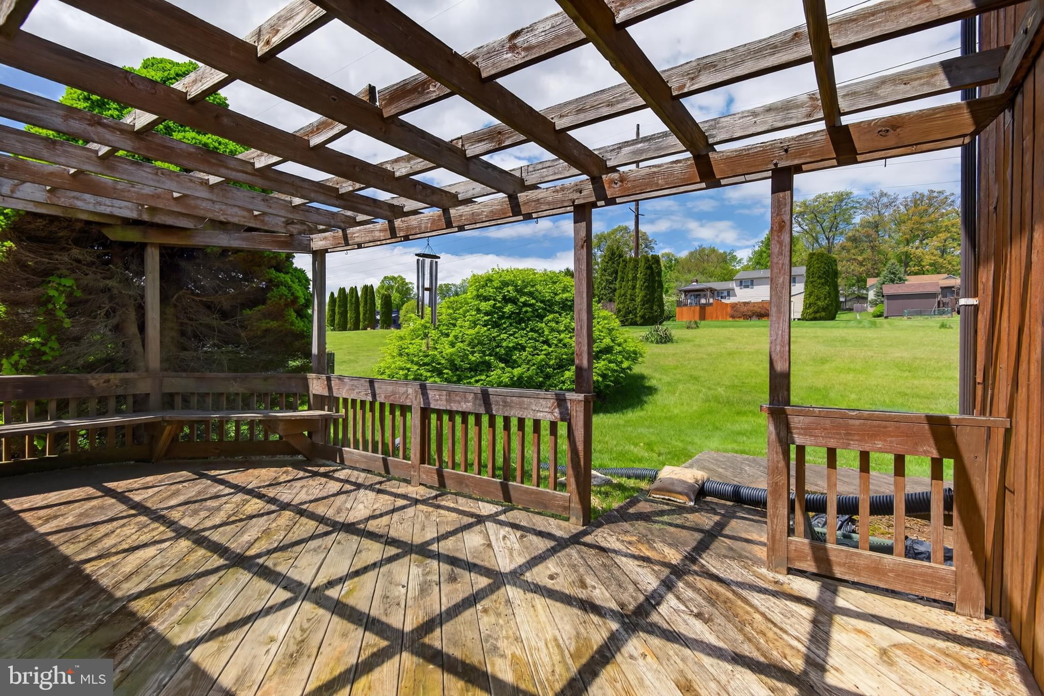 342 Larkin Drive Red Lion, PA 17356 - Photo 30 of 38 a view of a patio with a table chairs and a backyard