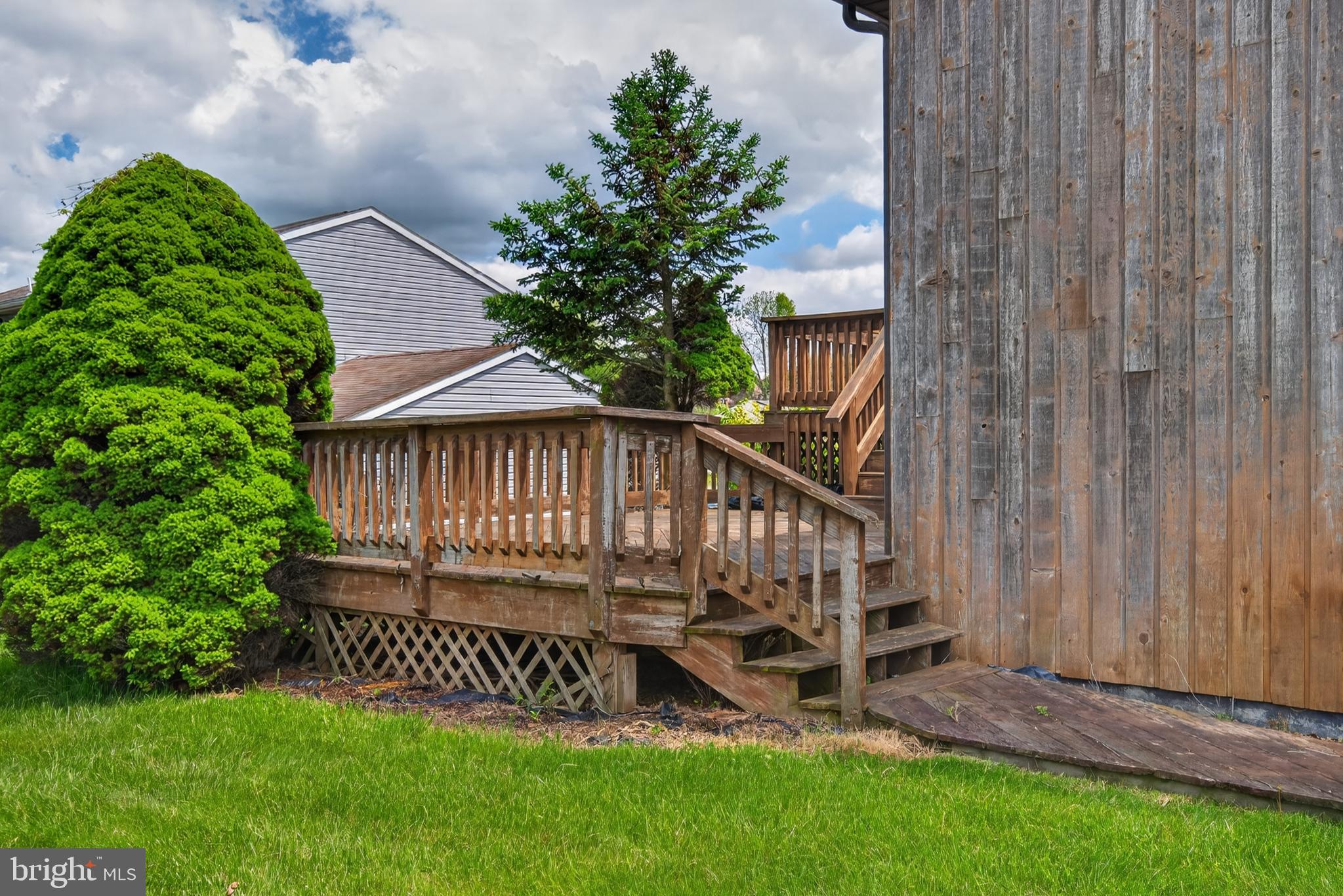 342 Larkin Drive Red Lion, PA 17356 - Photo 33 of 38 a view of backyard with deck and garden