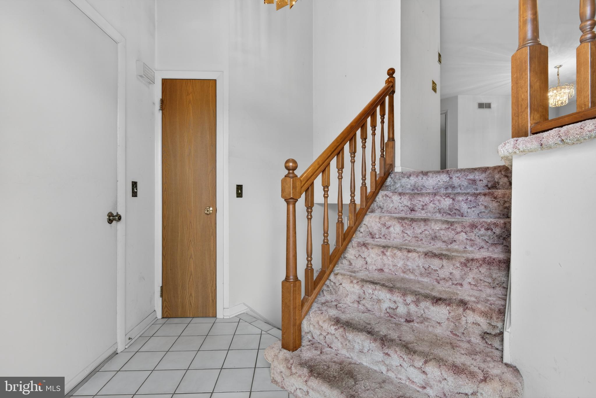 342 Larkin Drive Red Lion, PA 17356 - Photo 4 of 38 a view of a hallway with wooden floor and entryway