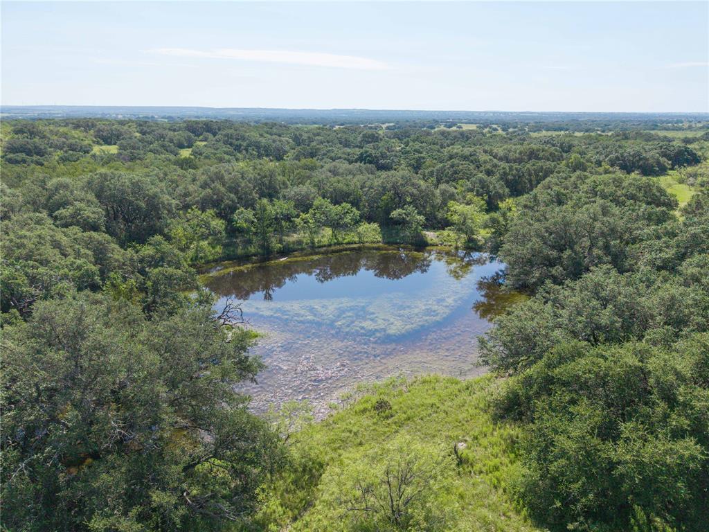 1467 S South Zephyr, TX 76890 - Photo 5 of 12 a view of a lake with mountains in the background