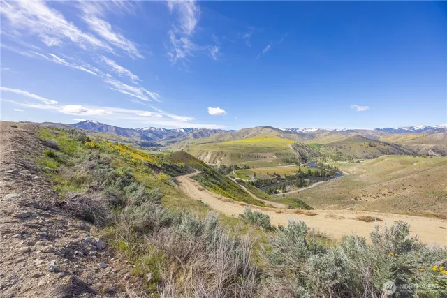 a view of lake with mountain