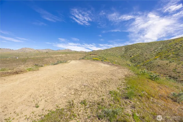 a view of a city with mountains in the background