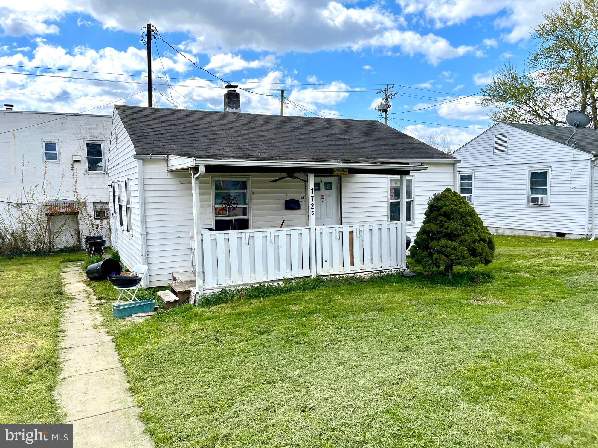 1727 Earhart Road Baltimore, MD 21221 - Photo 11 of 48 a view of a house with a yard