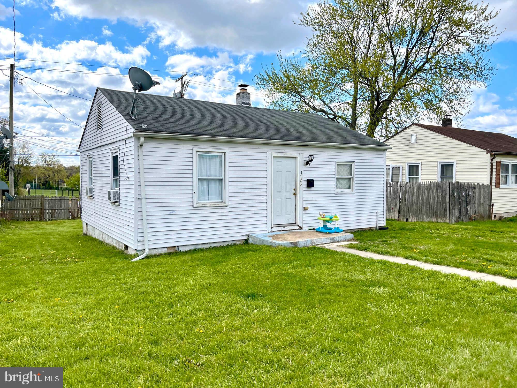 1727 Earhart Road Baltimore, MD 21221 - Photo 4 of 48 a view of a house with a backyard