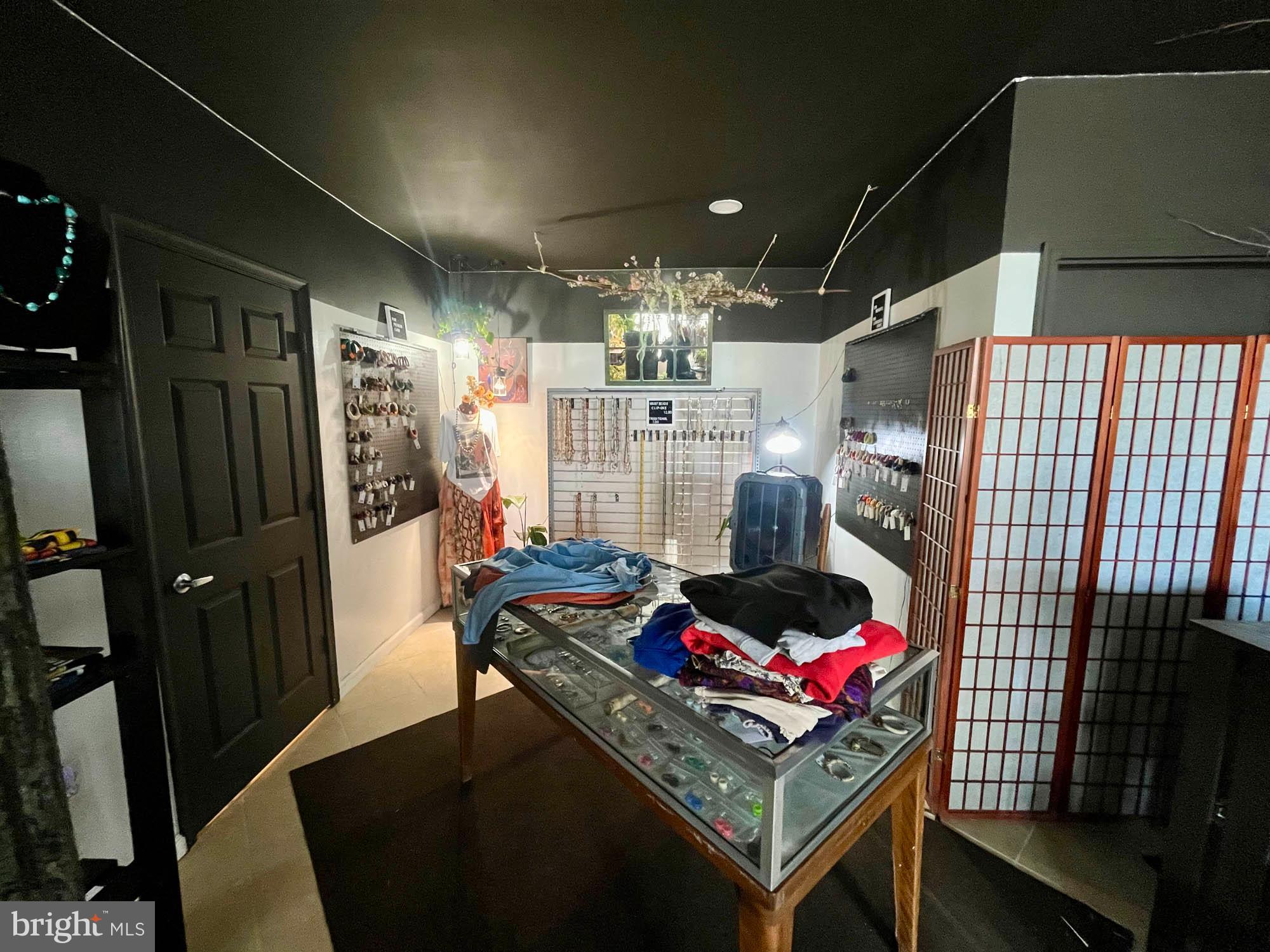 1727 Earhart Road Baltimore, MD 21221 - Photo 45 of 48 a room with furniture and a chandelier