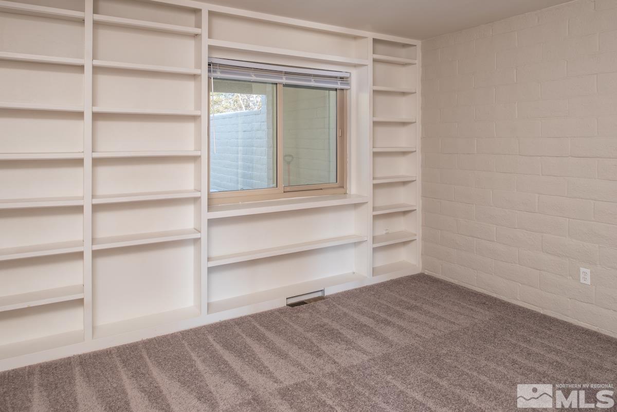 5038 Lakeridge Terrace East Reno, NV 89509 - Photo 13 of 23 a view of a room with rack on the wall