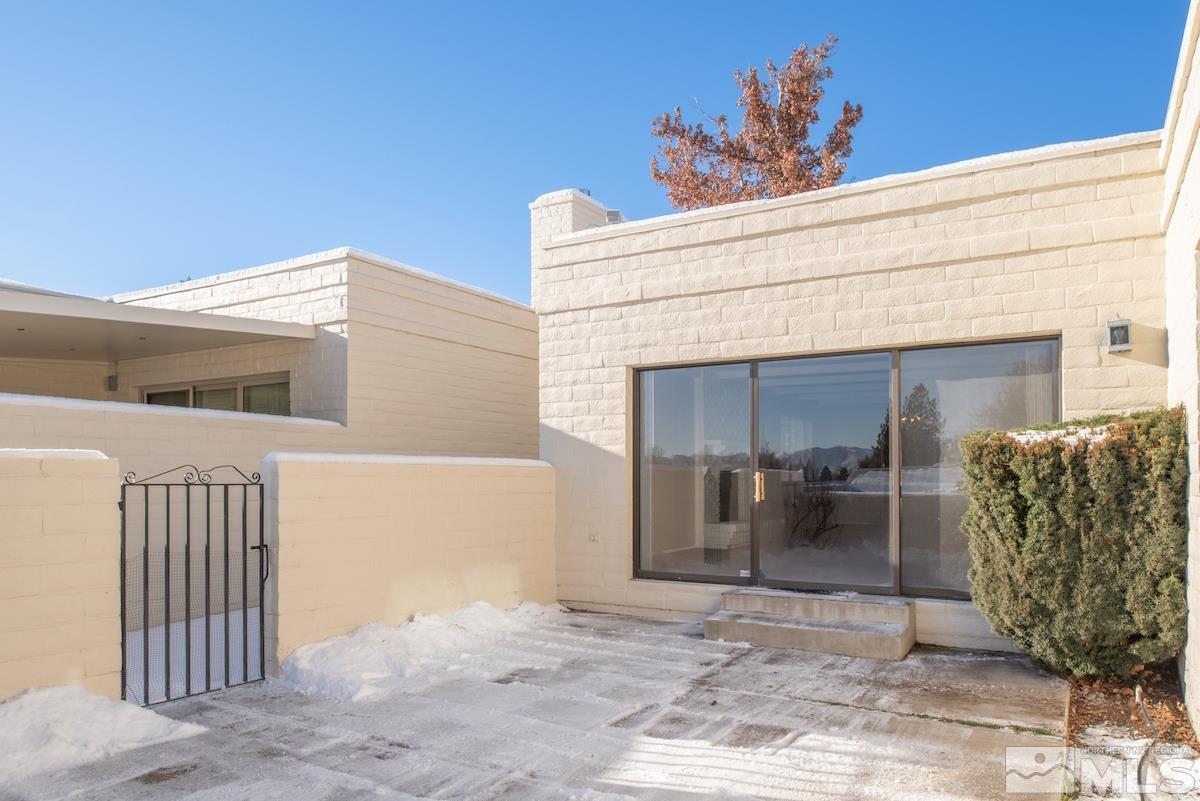 5038 Lakeridge Terrace East Reno, NV 89509 - Photo 18 of 23 a view of a house with a bench
