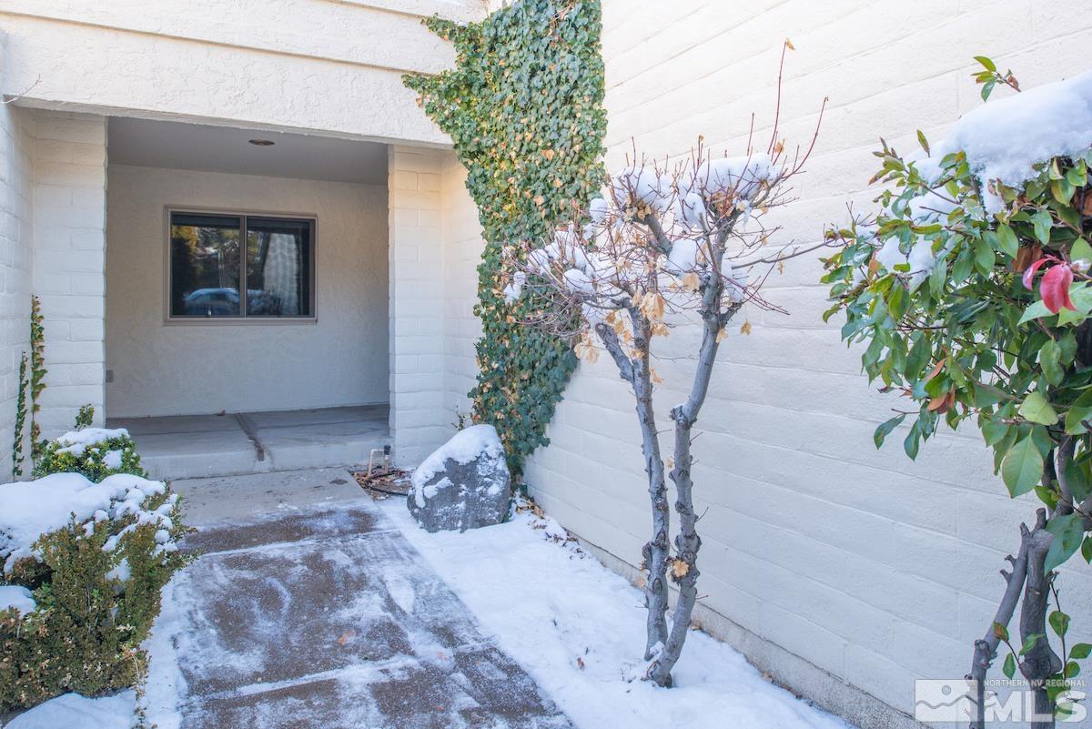 5038 Lakeridge Terrace East Reno, NV 89509 - Photo 2 of 23 a house with a tree in the background