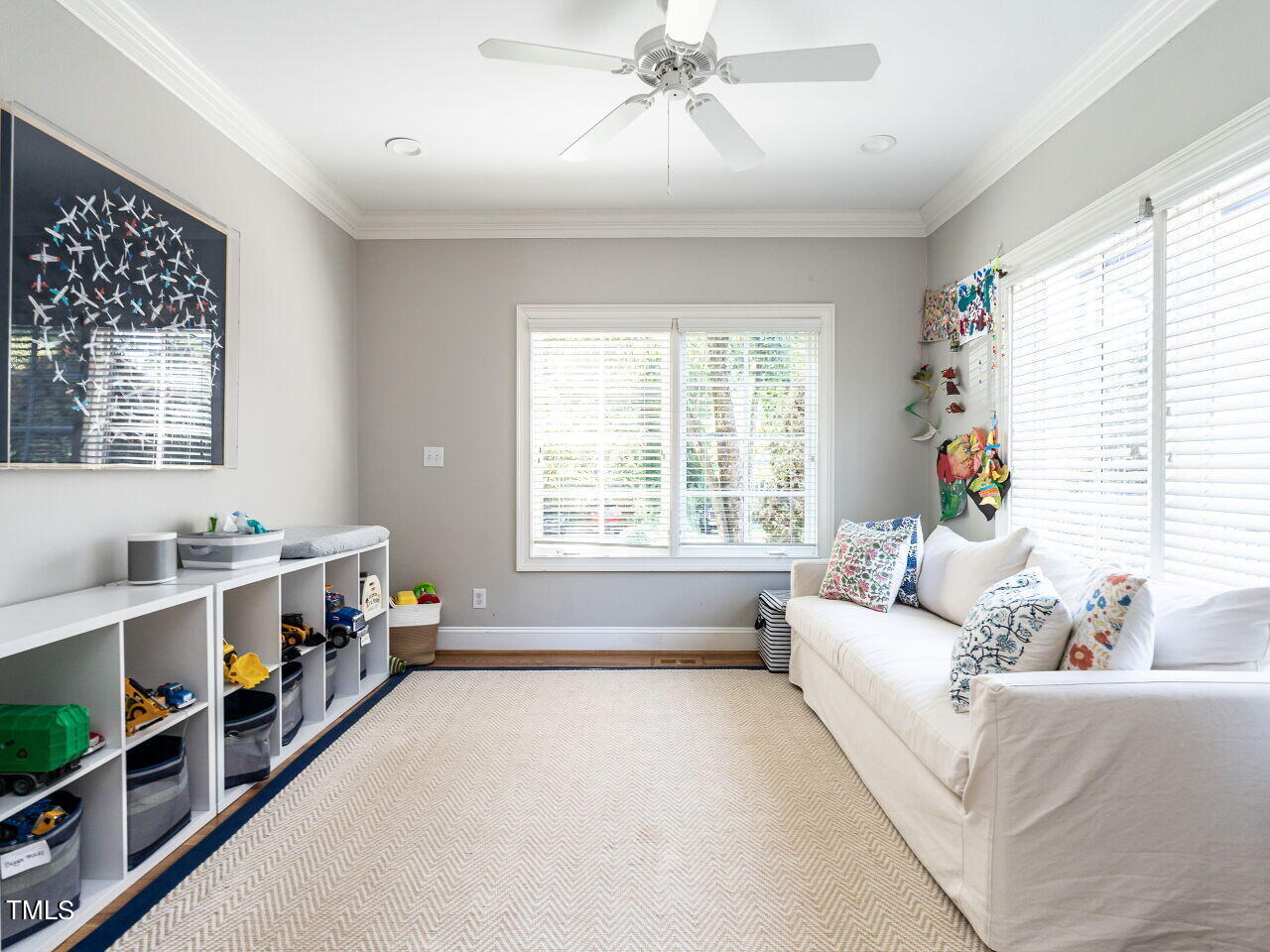 2624 Wells Avenue Raleigh, NC 27608 - Photo 13 of 35 a living room with furniture and a window