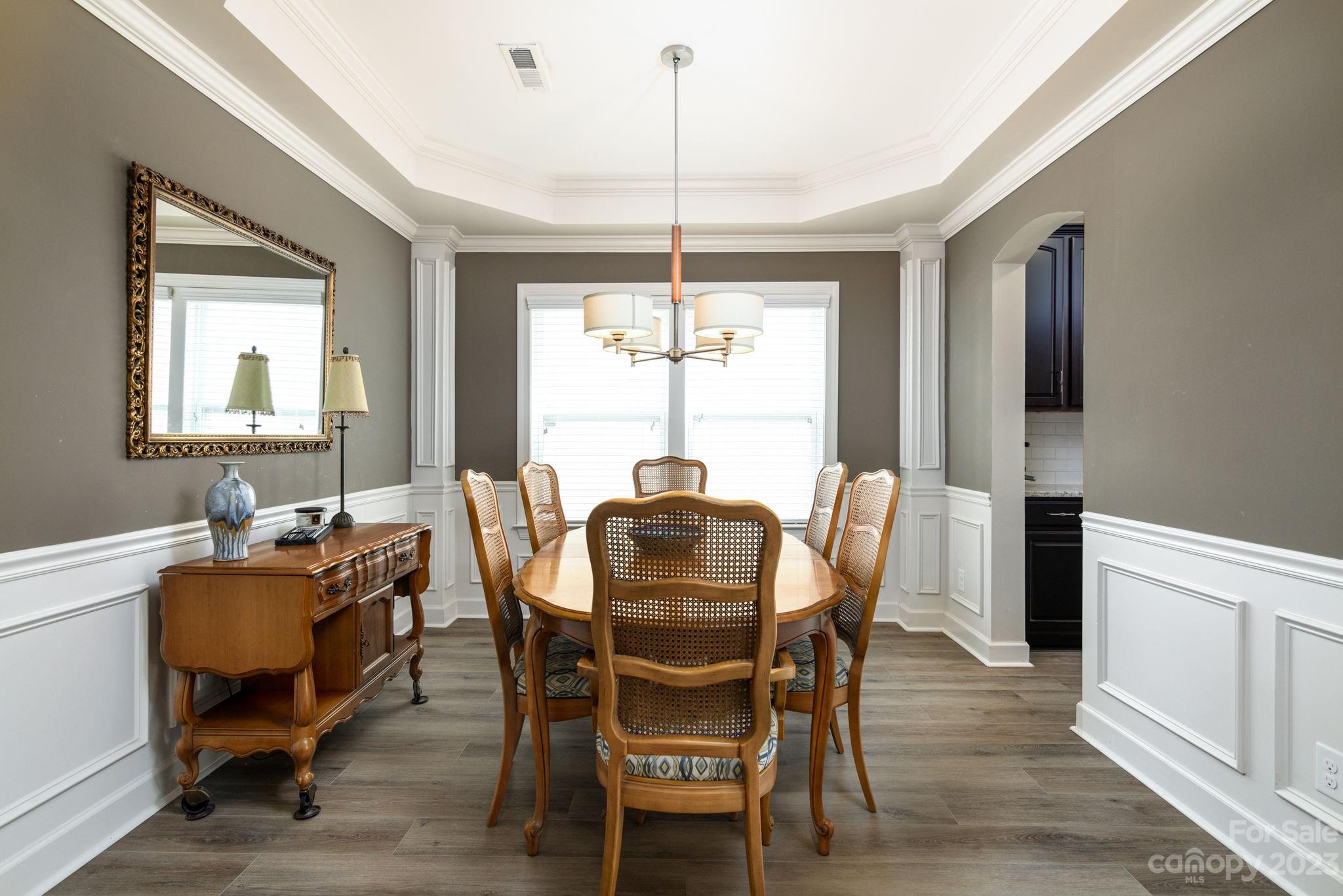 2191 Bluebell Way Tega Cay, SC 29708 - Photo 8 of 36 a view of a dining room with furniture window and outside view