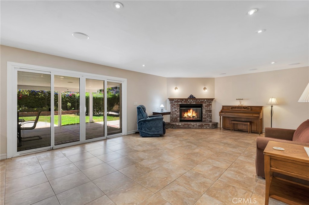 2146 North Brower Street Simi Valley, CA 93065 - Photo 12 of 51 a living room with furniture and a fireplace