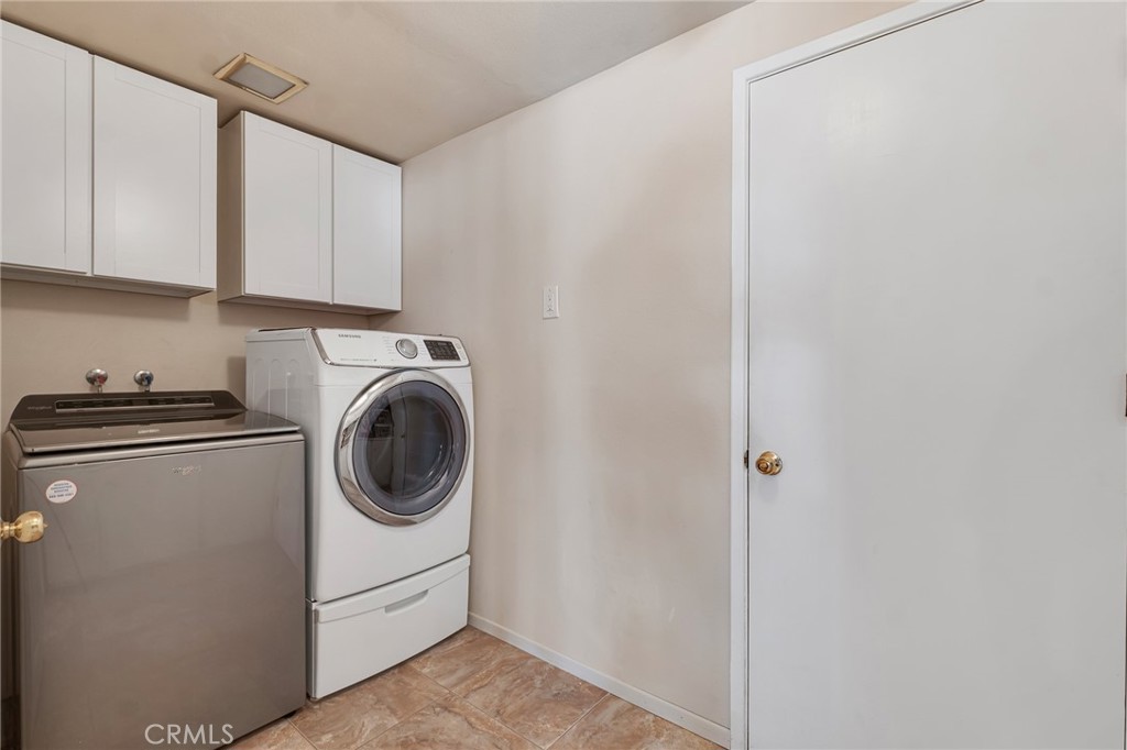 2146 North Brower Street Simi Valley, CA 93065 - Photo 13 of 51 a utility room with sink dryer and washer
