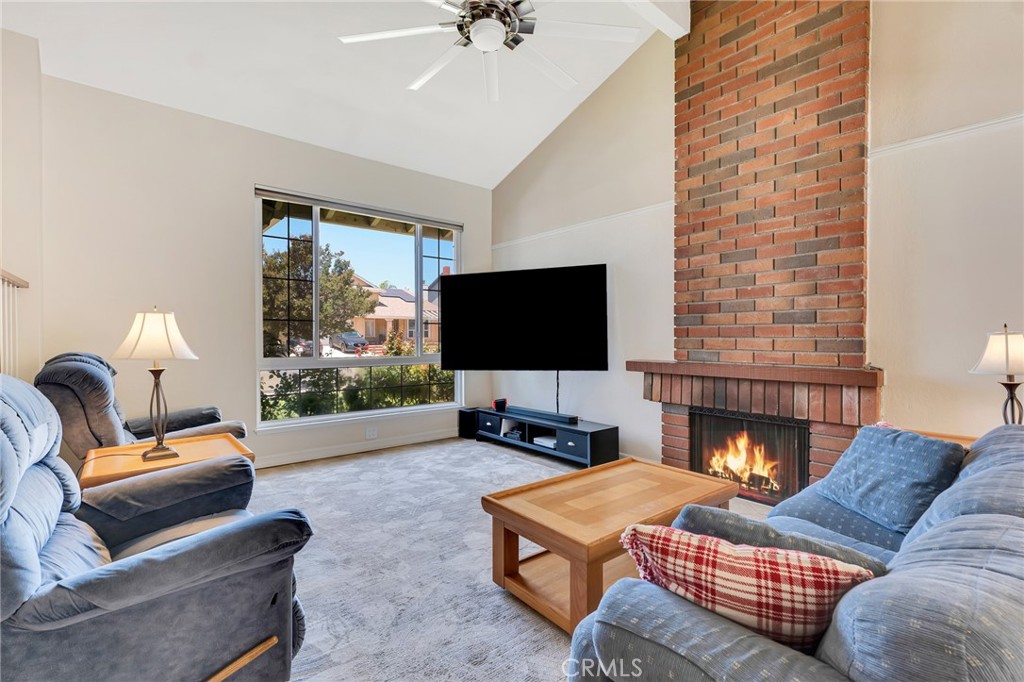 2146 North Brower Street Simi Valley, CA 93065 - Photo 14 of 51 a living room with furniture and a flat screen tv