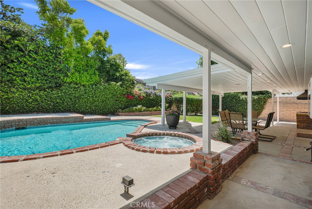 2146 North Brower Street Simi Valley, CA 93065 - Photo 33 of 51 a view of a house with backyard porch and sitting area