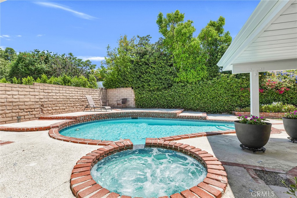 2146 North Brower Street Simi Valley, CA 93065 - Photo 34 of 51 a view of a swimming pool with a patio