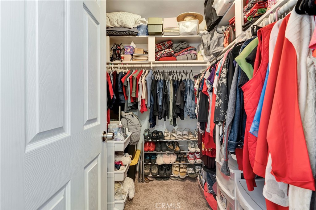 2146 North Brower Street Simi Valley, CA 93065 - Photo 40 of 51 a view of walk in closet with clothes