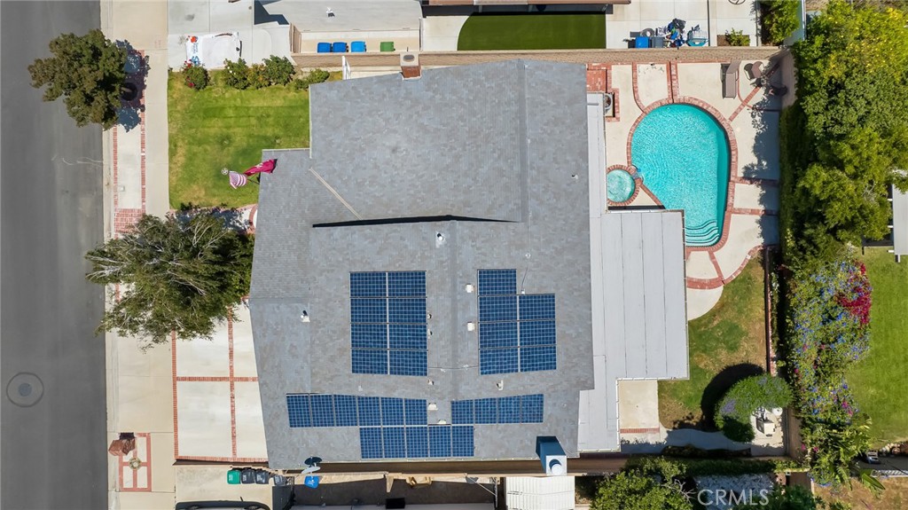 2146 North Brower Street Simi Valley, CA 93065 - Photo 4 of 51 an aerial view of a house with a swimming pool and plants