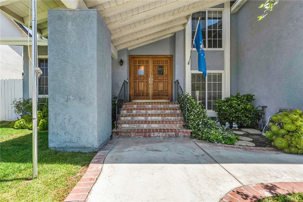 2146 North Brower Street Simi Valley, CA 93065 - Photo 48 of 51 a front view of a house with a garden