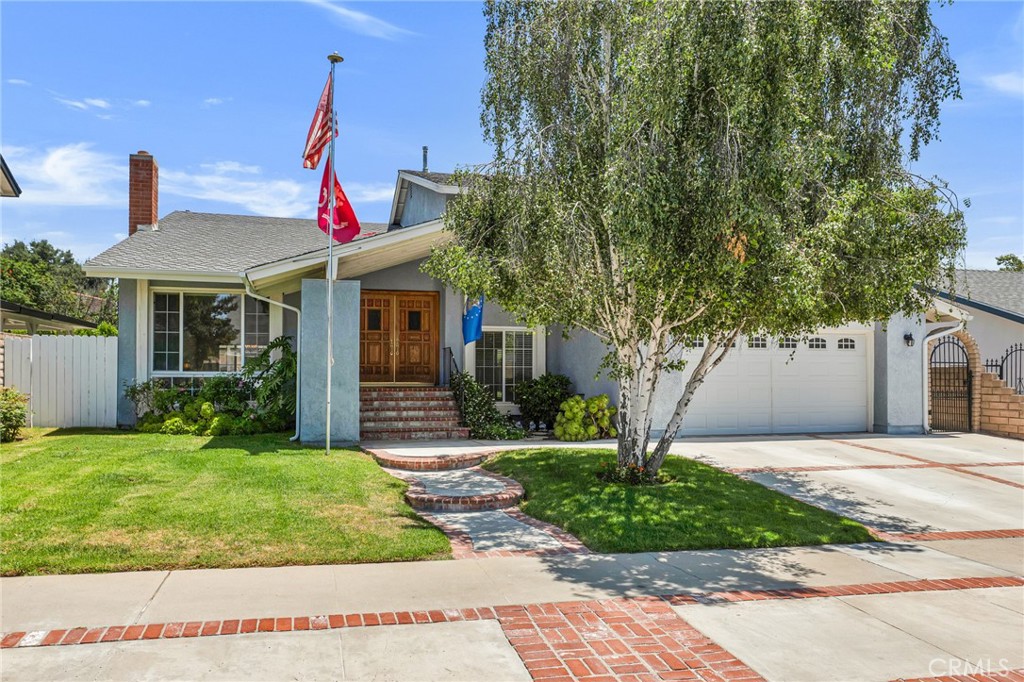 2146 North Brower Street Simi Valley, CA 93065 - Photo 50 of 51 a front view of a house with garden