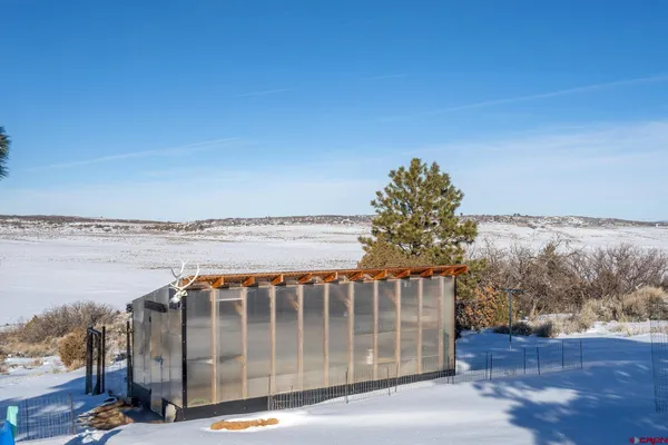 a view of swimming pool with a yard