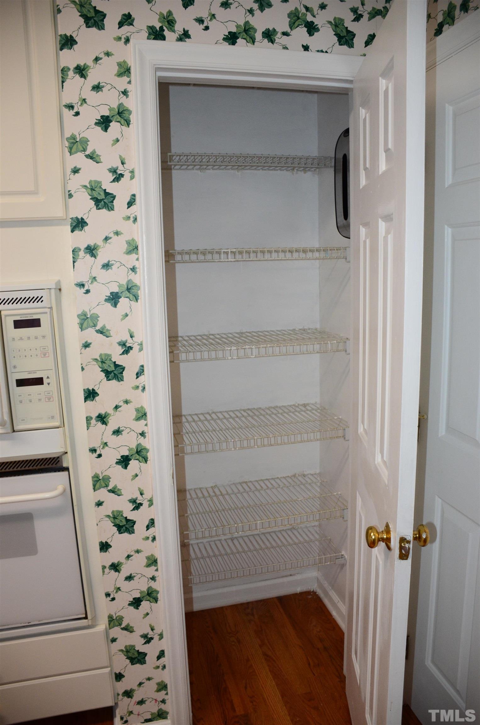 118 Covington Square Drive Cary, NC 27513 - Photo 14 of 58 a view of a bathroom with a sink and a mirror