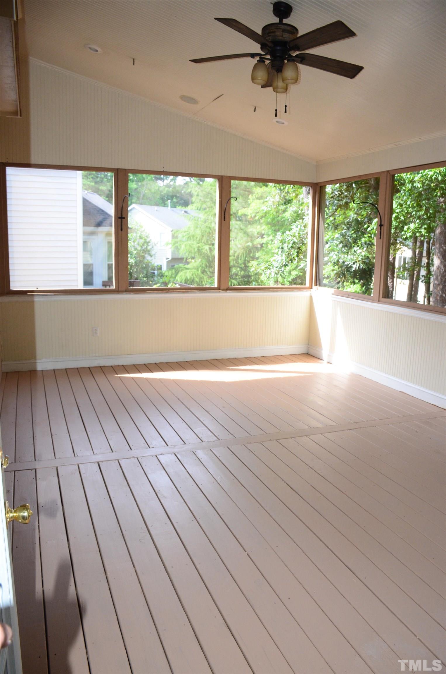 118 Covington Square Drive Cary, NC 27513 - Photo 20 of 58 a view of a room with wooden floor and windows