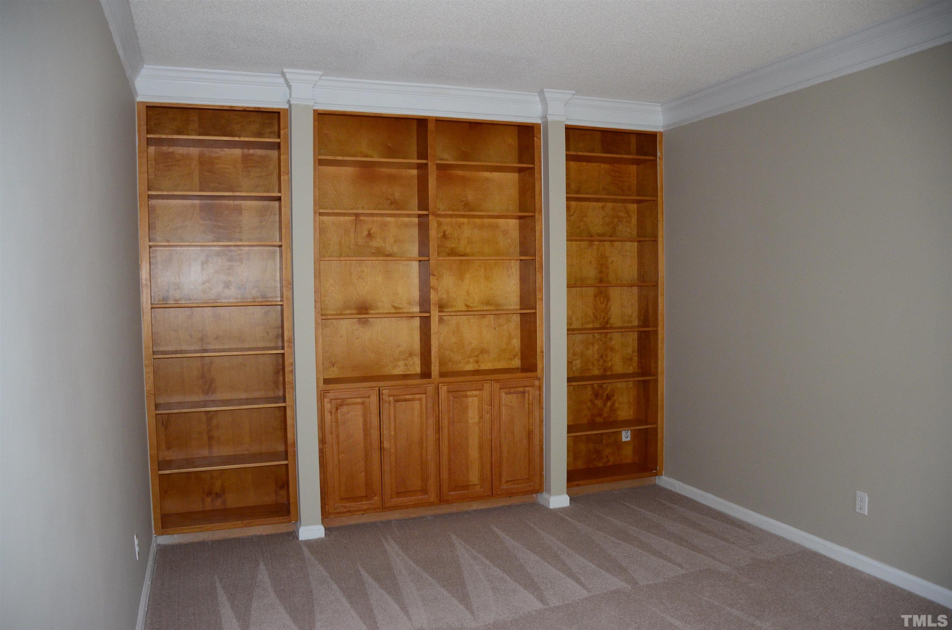 118 Covington Square Drive Cary, NC 27513 - Photo 2 of 58 a view of walk in closet with empty racks