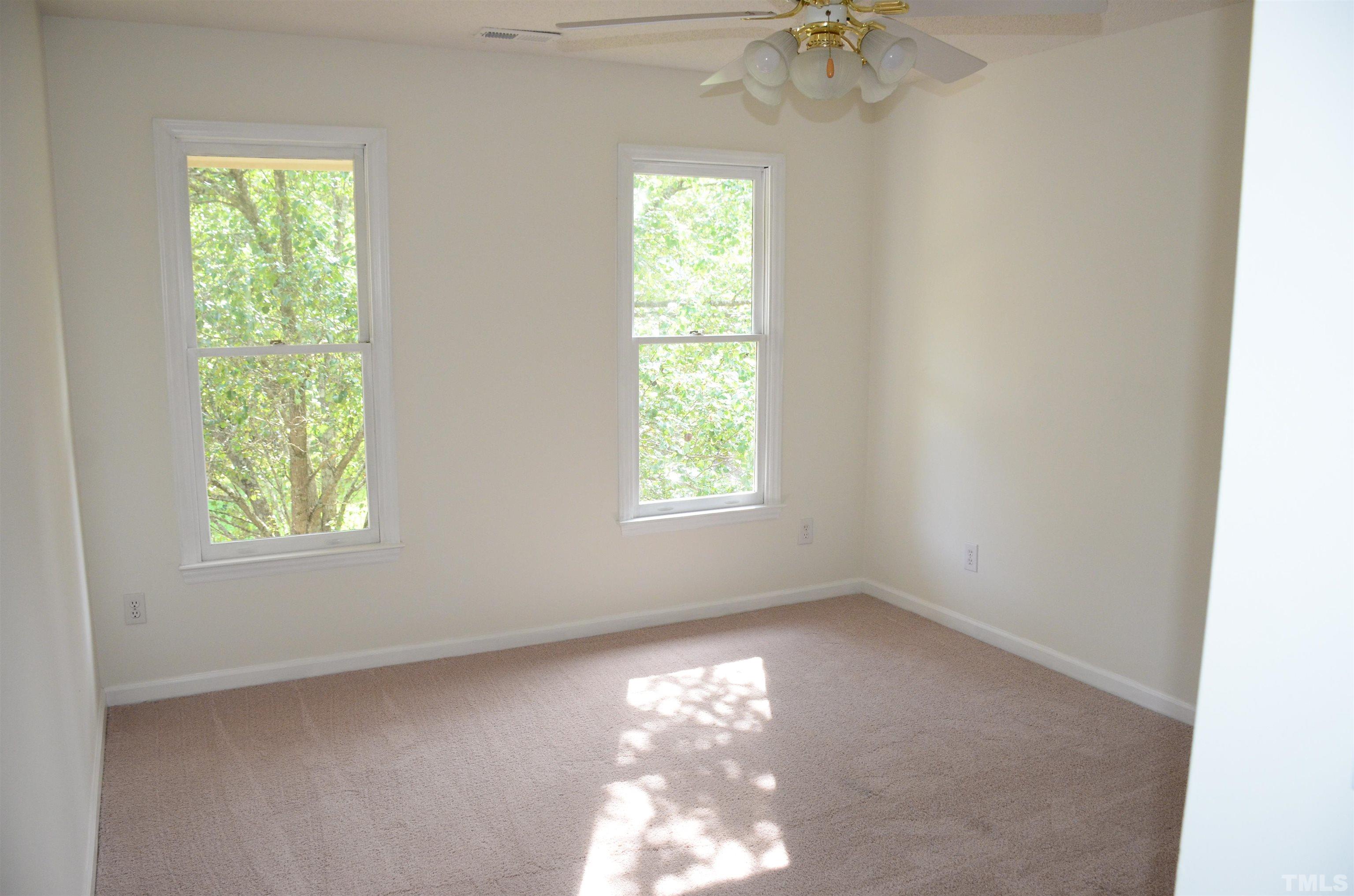 118 Covington Square Drive Cary, NC 27513 - Photo 31 of 58 an empty room with a window