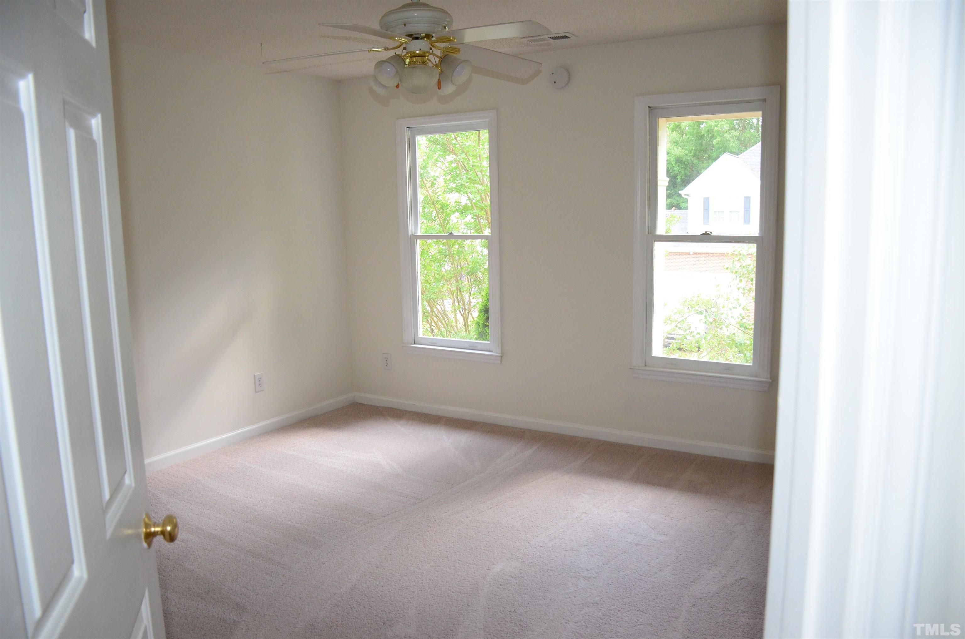118 Covington Square Drive Cary, NC 27513 - Photo 38 of 58 an empty room with a window
