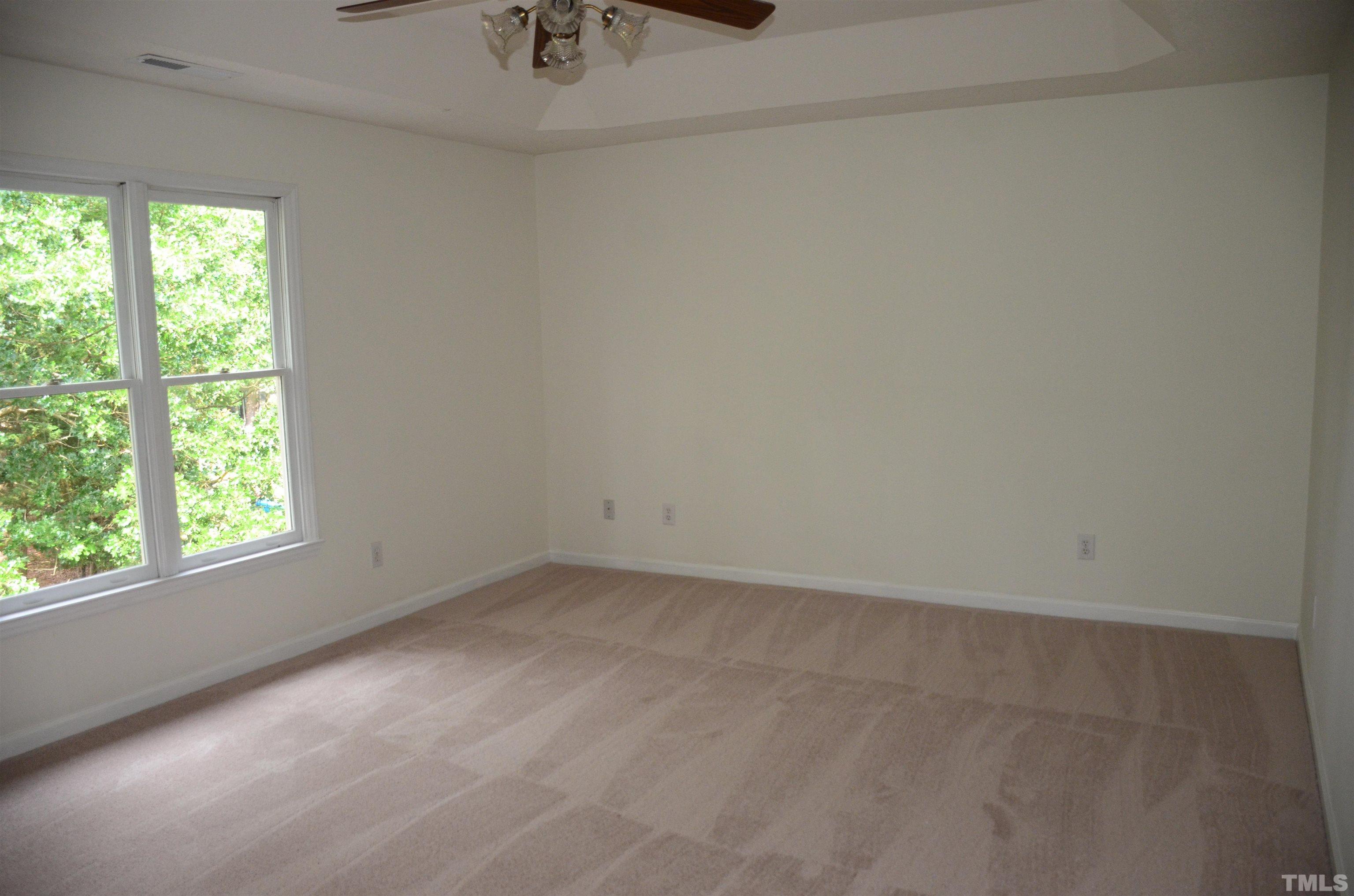 118 Covington Square Drive Cary, NC 27513 - Photo 41 of 58 an empty room with a window