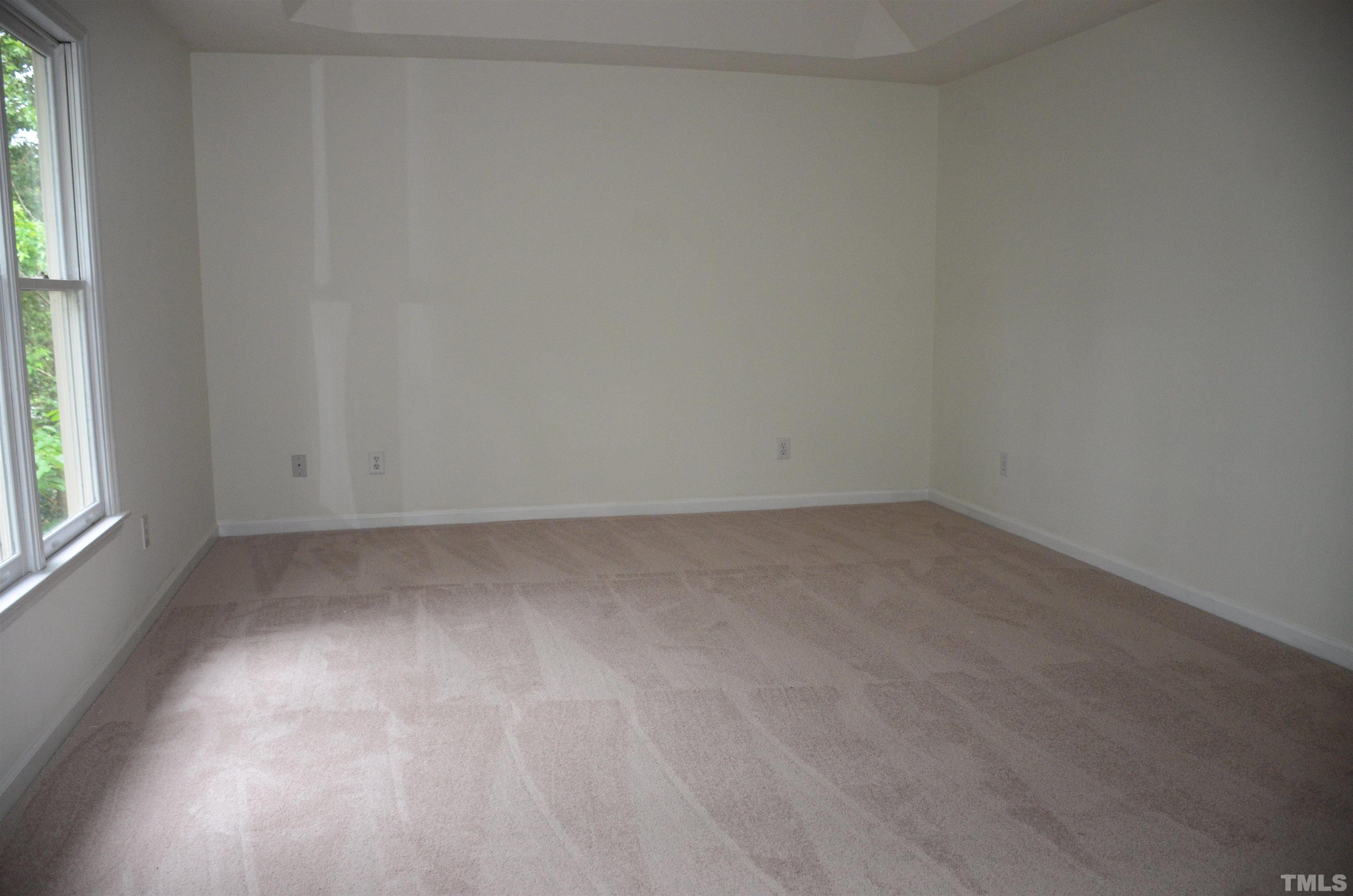 118 Covington Square Drive Cary, NC 27513 - Photo 50 of 58 an empty room with a window