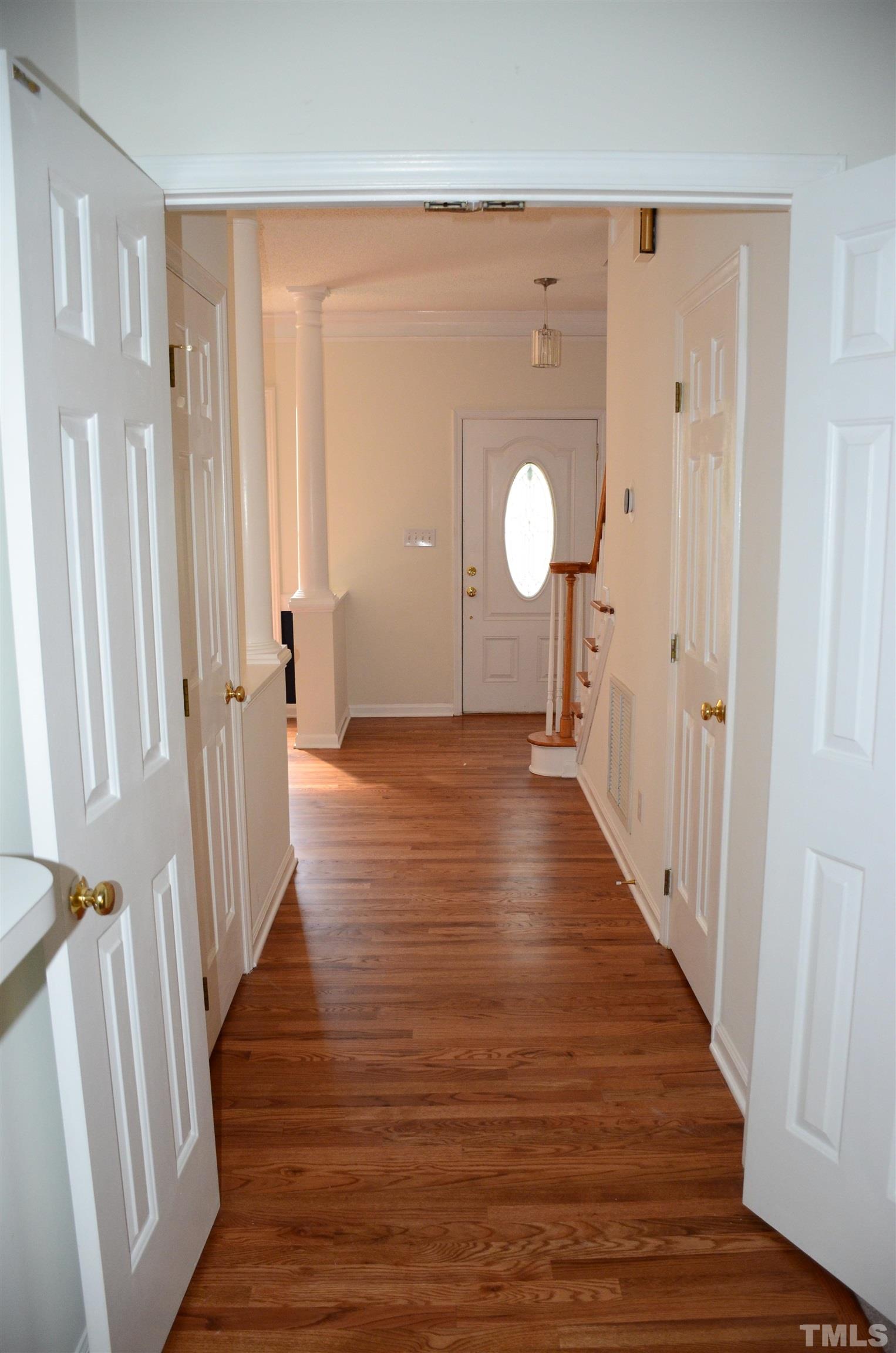 118 Covington Square Drive Cary, NC 27513 - Photo 7 of 58 a view of a room with wooden floor and windows