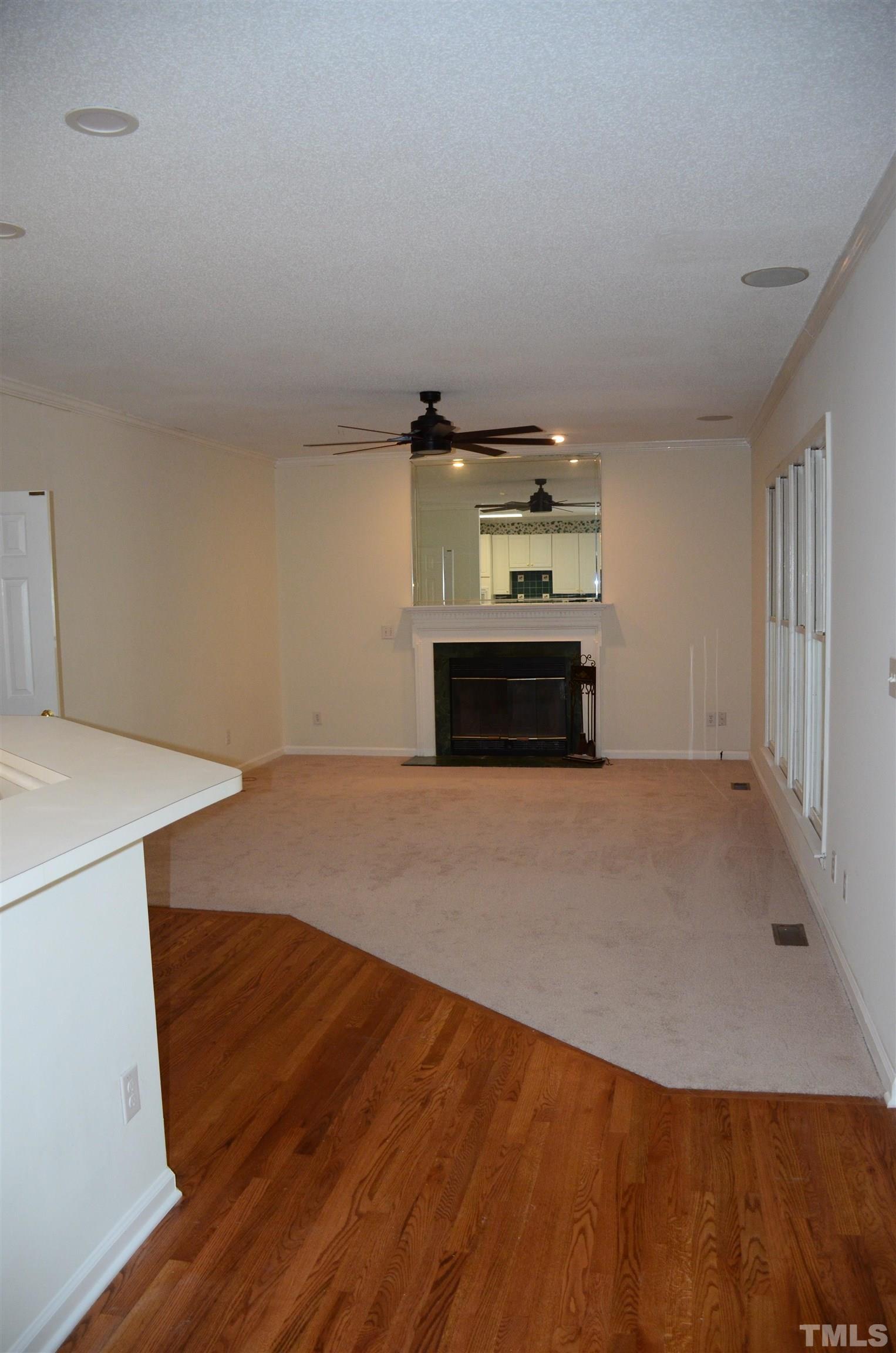 118 Covington Square Drive Cary, NC 27513 - Photo 9 of 58 a bedroom with a bed and cabinets