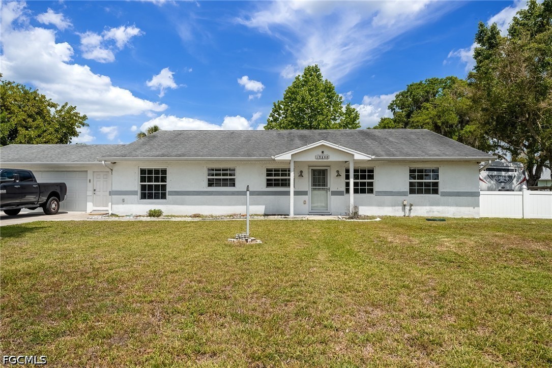 17290 Rewis Road Alva, FL 33920 - Photo 4 of 50 a front view of house with swimming pool