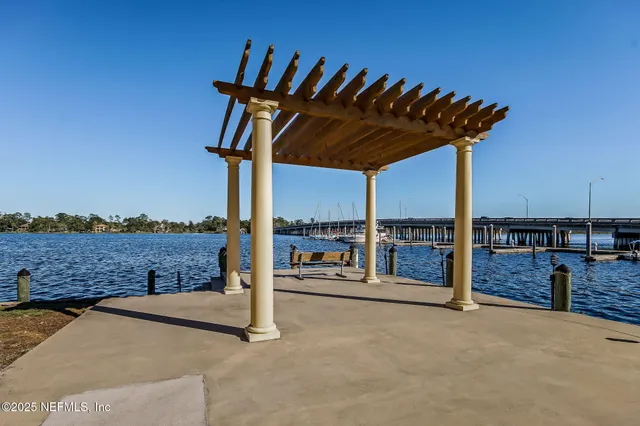 a view of swimming pool with seating space