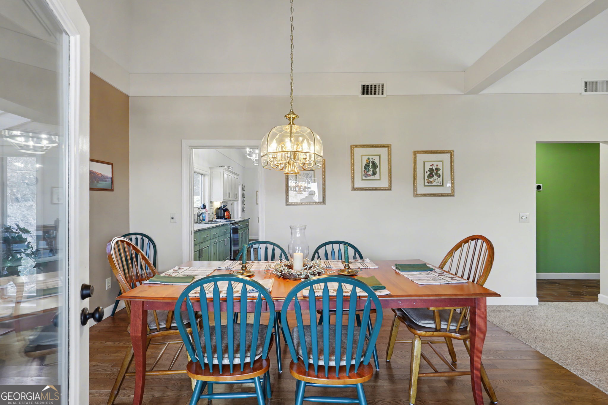 62 Sunvalley Circle, Unit 7006 Dillard, GA 30537 - Photo 17 of 55 a dining room with furniture a chandelier and wooden floor
