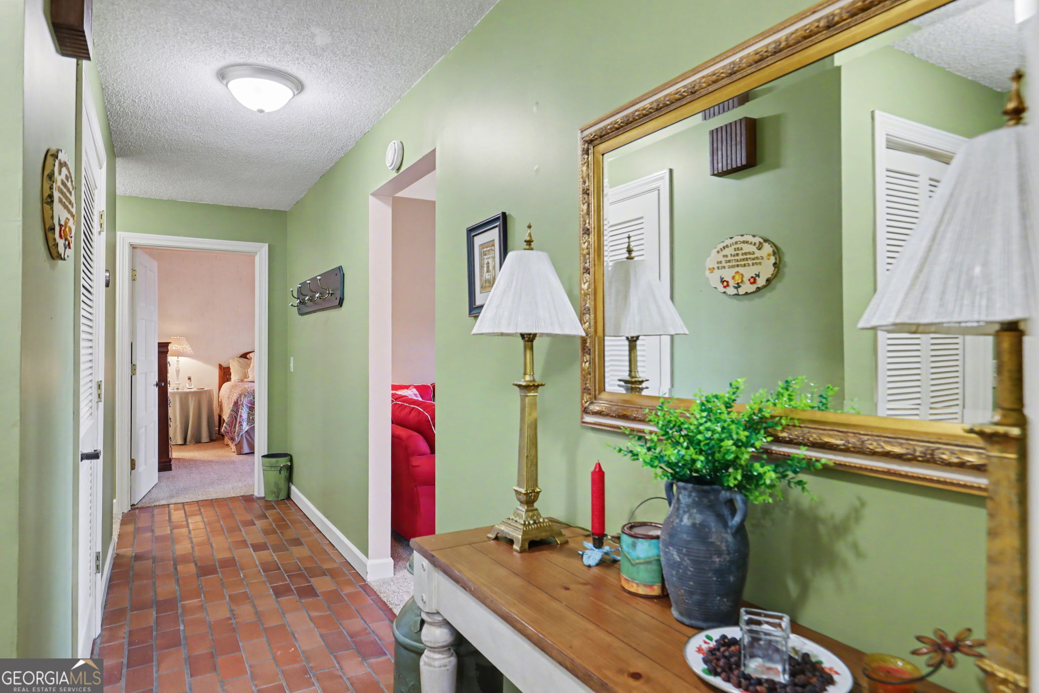 62 Sunvalley Circle, Unit 7006 Dillard, GA 30537 - Photo 24 of 55 a living room with furniture and a potted plant