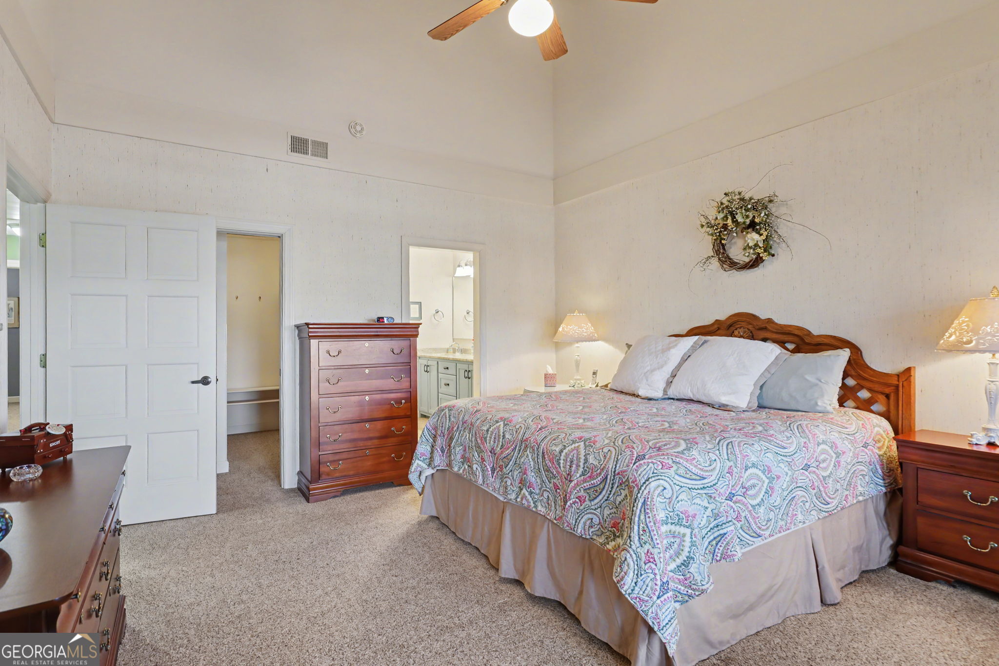 62 Sunvalley Circle, Unit 7006 Dillard, GA 30537 - Photo 30 of 55 a bedroom with a bed and a chandelier