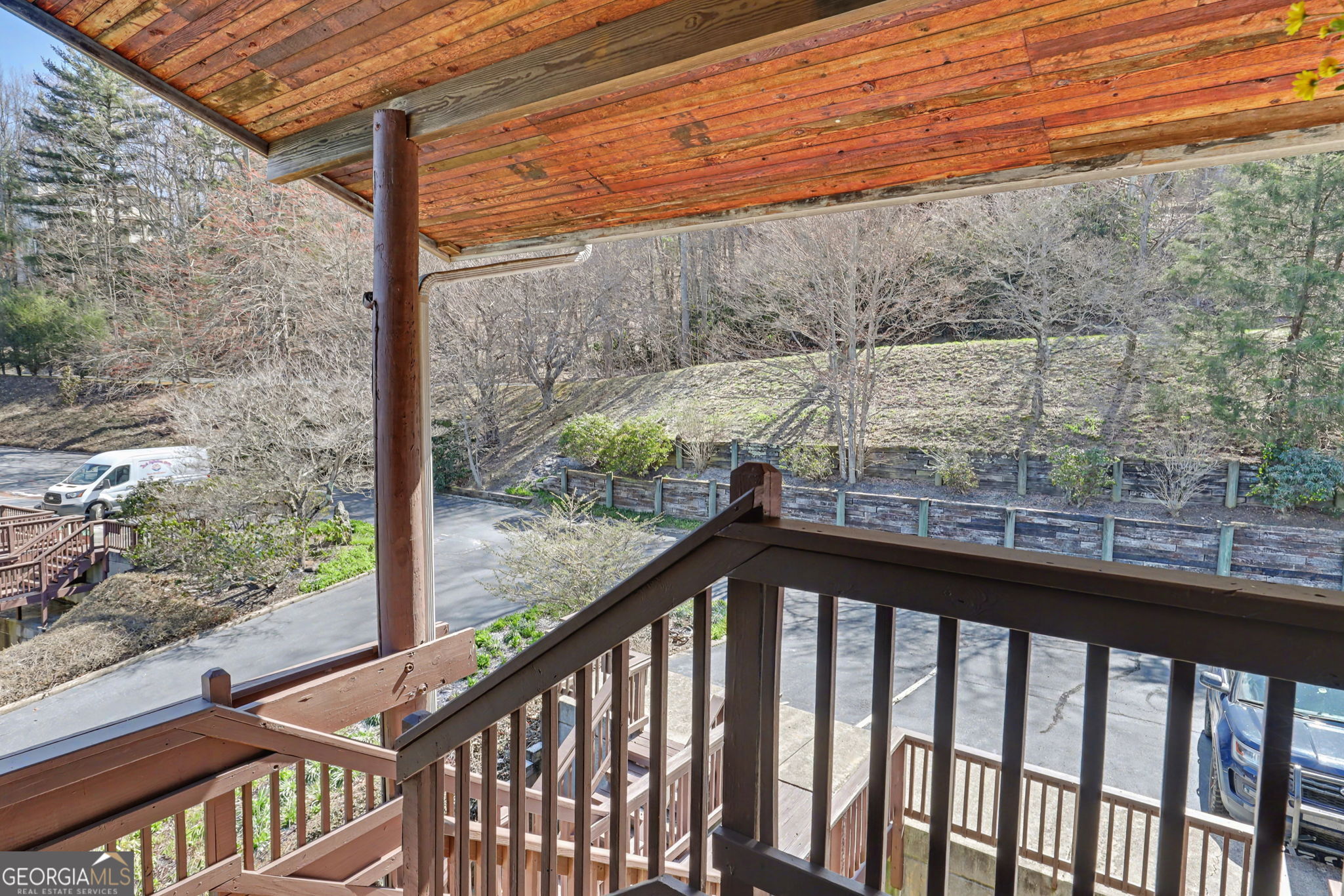 62 Sunvalley Circle, Unit 7006 Dillard, GA 30537 - Photo 3 of 55 a view of a balcony with yard