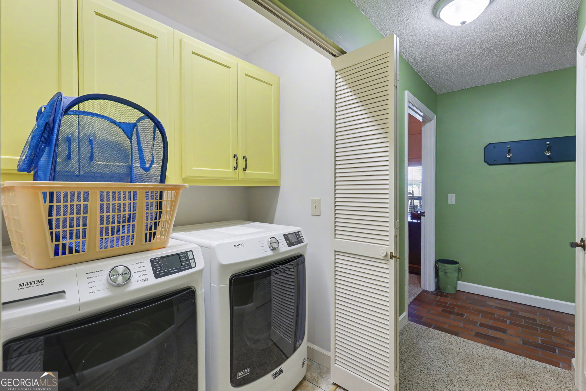 62 Sunvalley Circle, Unit 7006 Dillard, GA 30537 - Photo 44 of 55 a utility room with dryer and washer