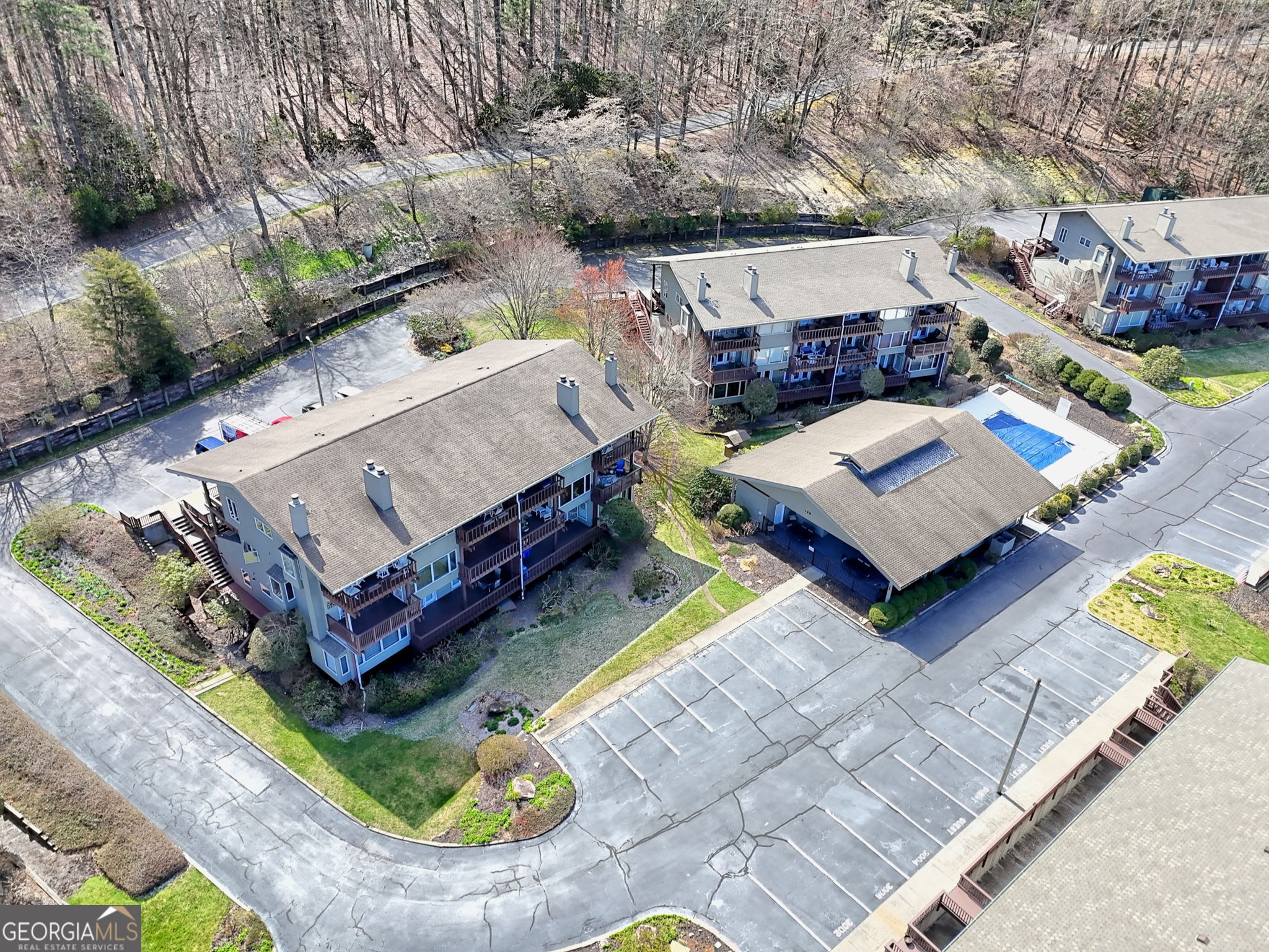 62 Sunvalley Circle, Unit 7006 Dillard, GA 30537 - Photo 51 of 55 an aerial view of a house with a yard swimming pool and outdoor seating